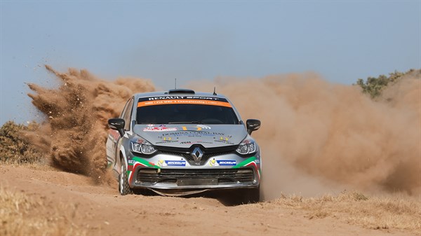 Renault Sport Car driving over a dune